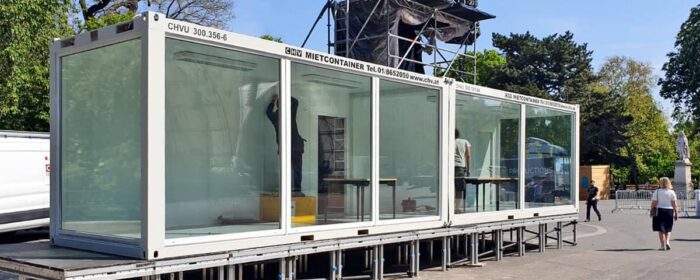Fixed glazed container modular double as information booth at the Wiener Festwochen, Rathausplatz 2019.